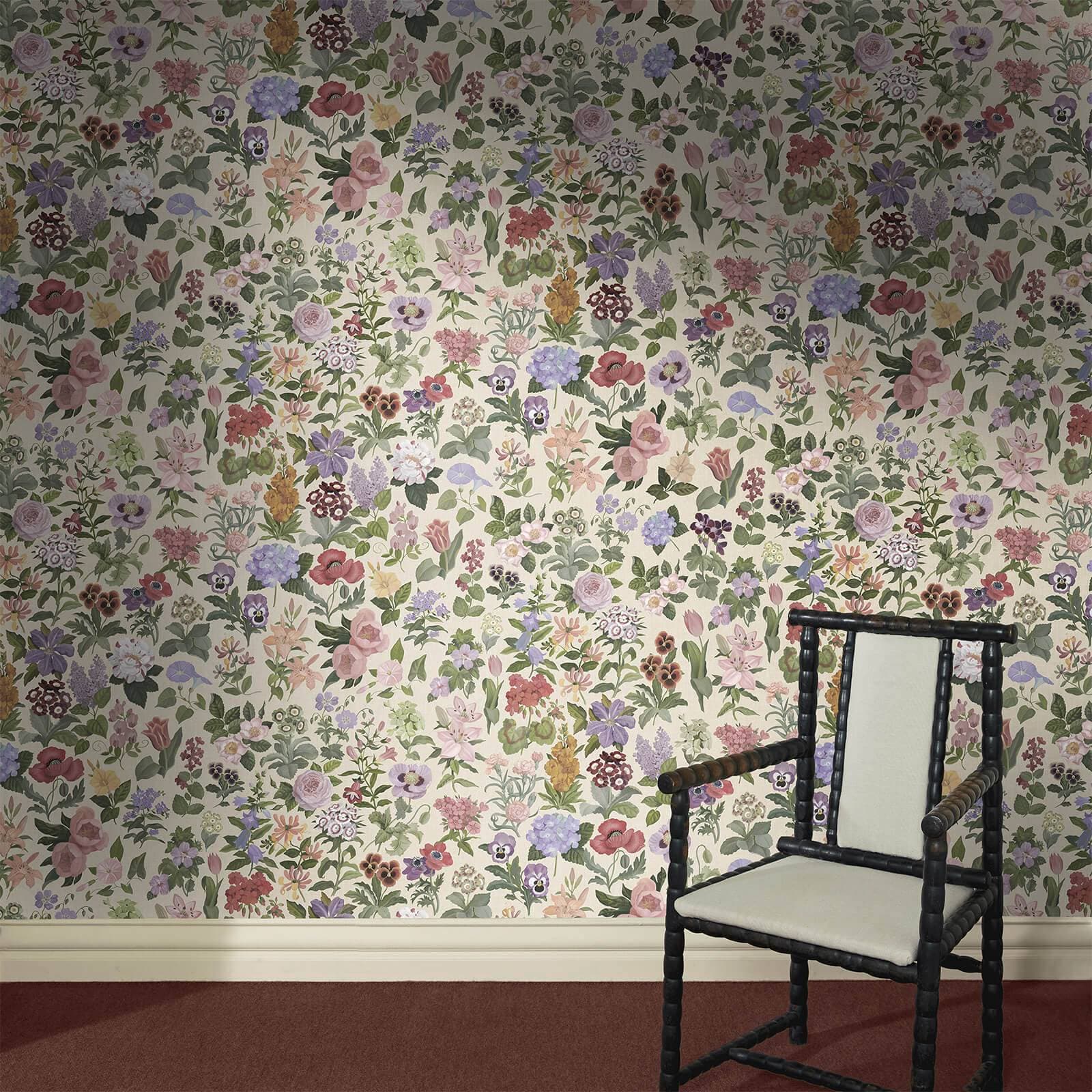 The Botanic Quiet wallpaper in ecru, hung on a wall
